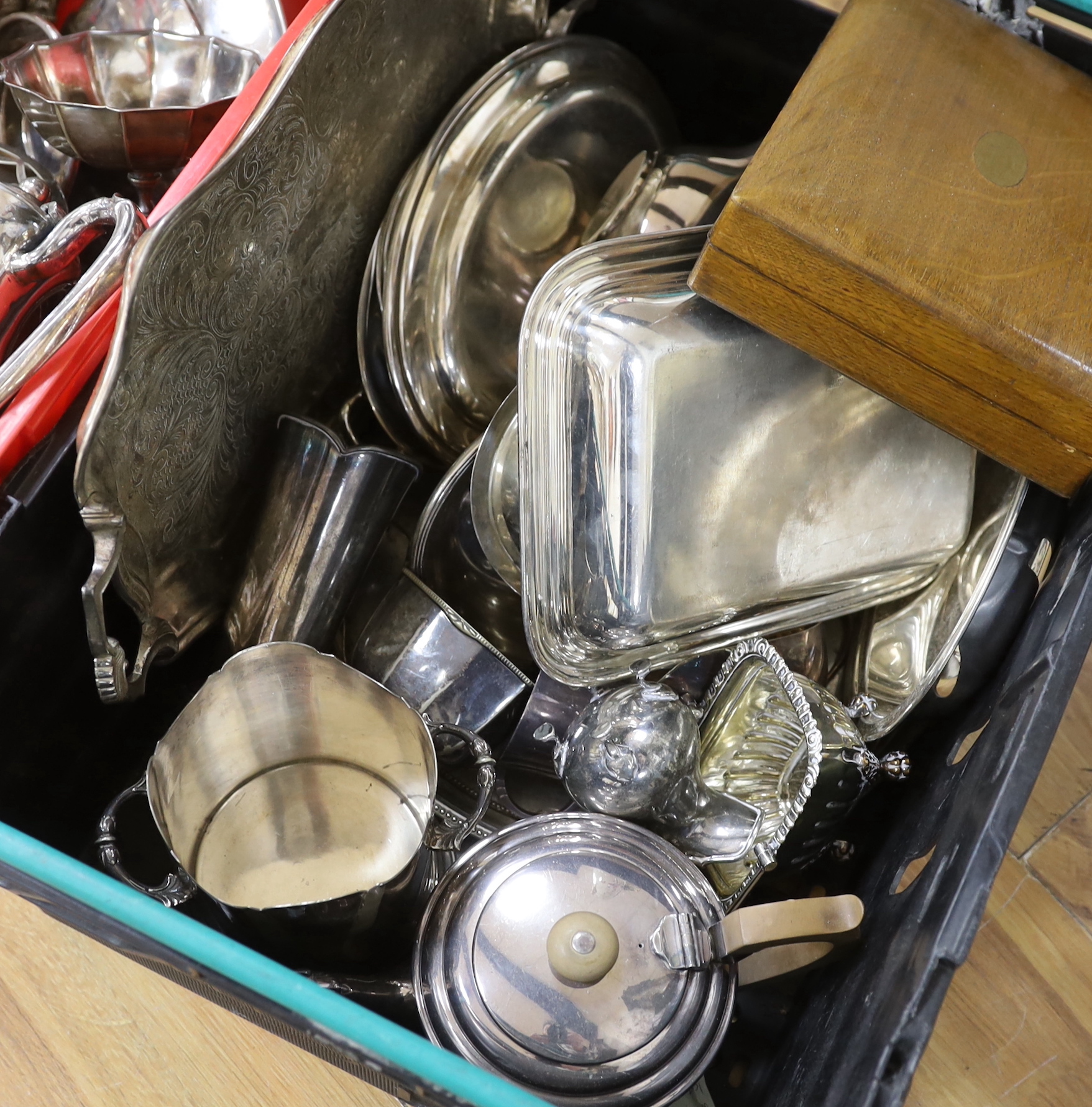 An assortment of silver plated ware including breakfast dishes, oval tray and vases